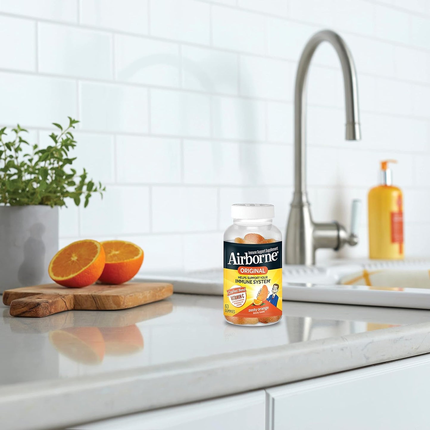 Airborne 750mg Vitamin C Gummies for Immune Support - Antioxidant Supplement with Vitamins C & E - 63 Zesty Orange Flavor Gummies