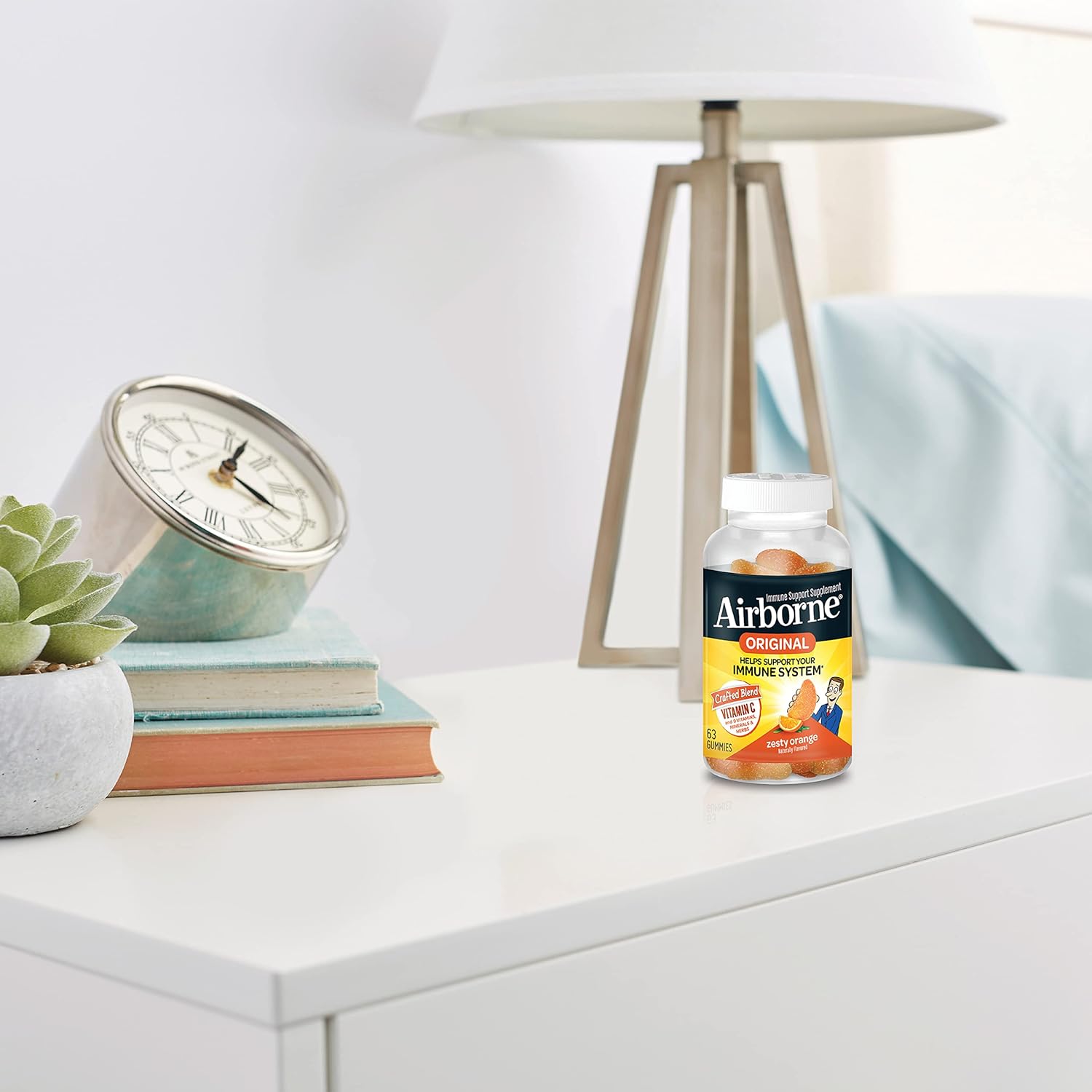 Airborne 750mg Vitamin C Gummies for Immune Support - Antioxidant Supplement with Vitamins C & E - 63 Zesty Orange Flavor Gummies