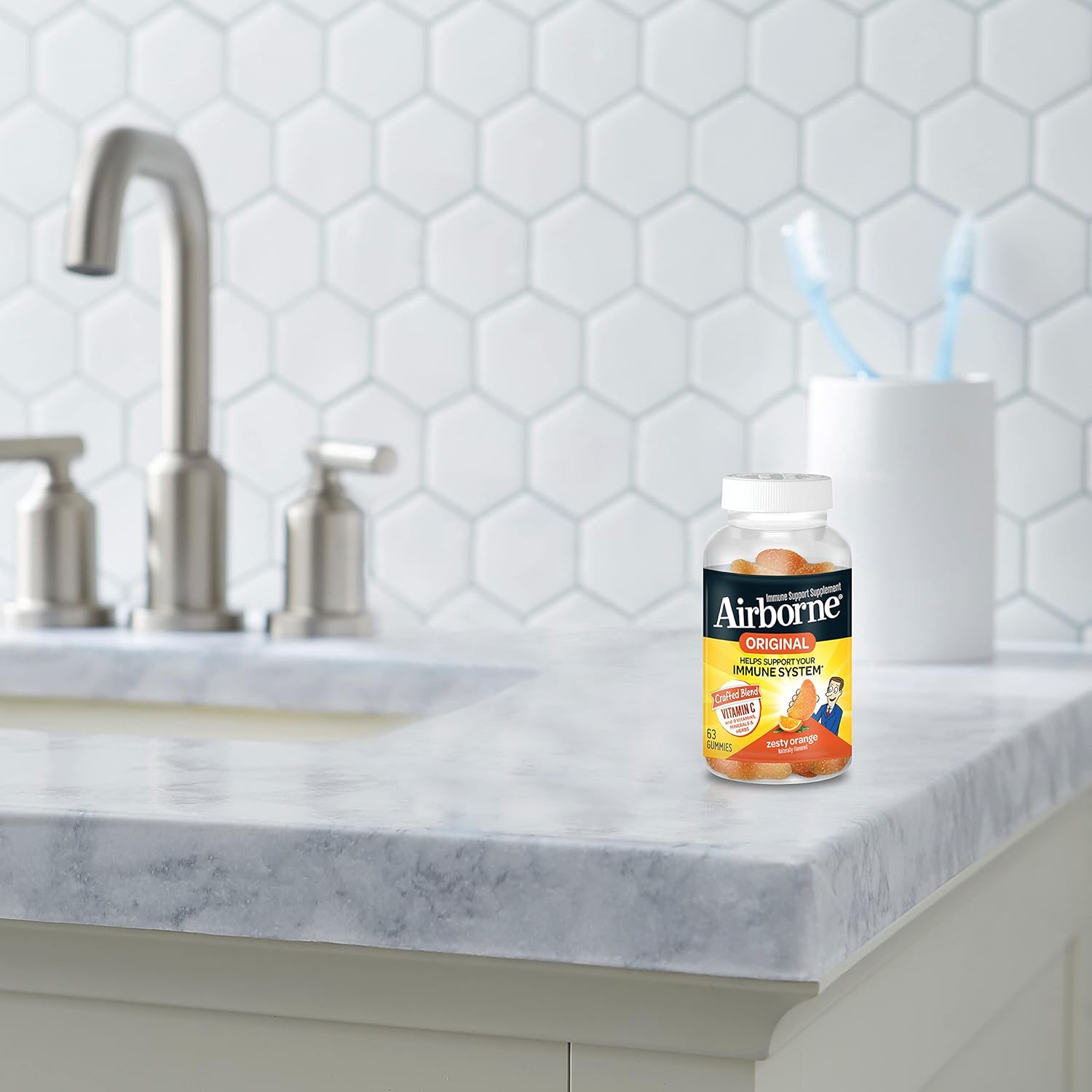 Airborne 750mg Vitamin C Gummies for Immune Support - Antioxidant Supplement with Vitamins C & E - 63 Zesty Orange Flavor Gummies